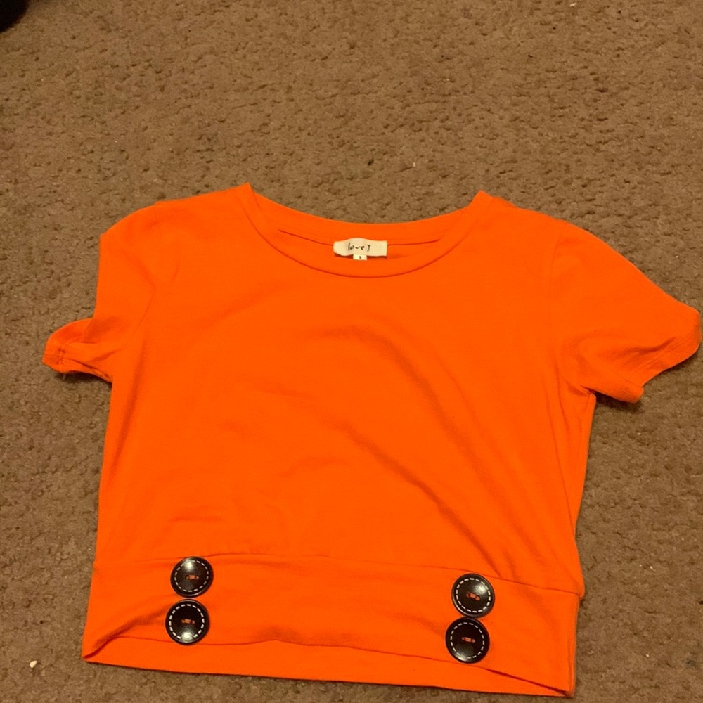 A nice orange crop top with black buttons